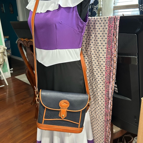 Dooney & Bourke Black and Tan Crossbody Bag with Signature Brass Lock - Picture 5 of 14